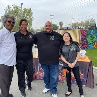 San Bernardino City Council member Kim with ONH staff at community event