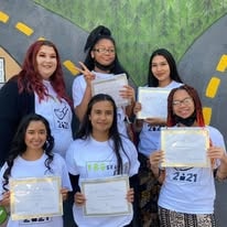 Group of YRG 2020 graduates holding certificates at Operation New Hope